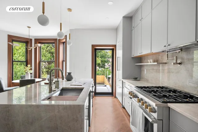 a living room with a bed and furniture