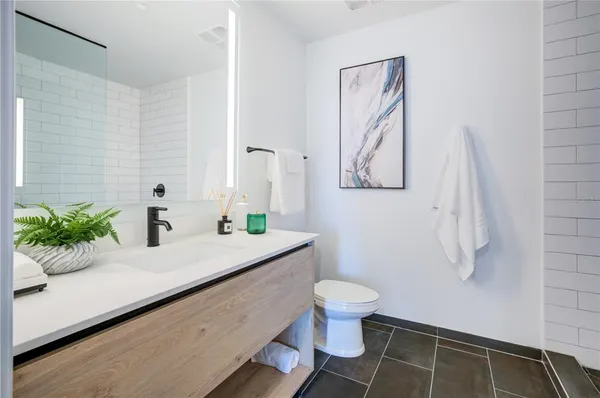 a bathroom with a sink and a toilet