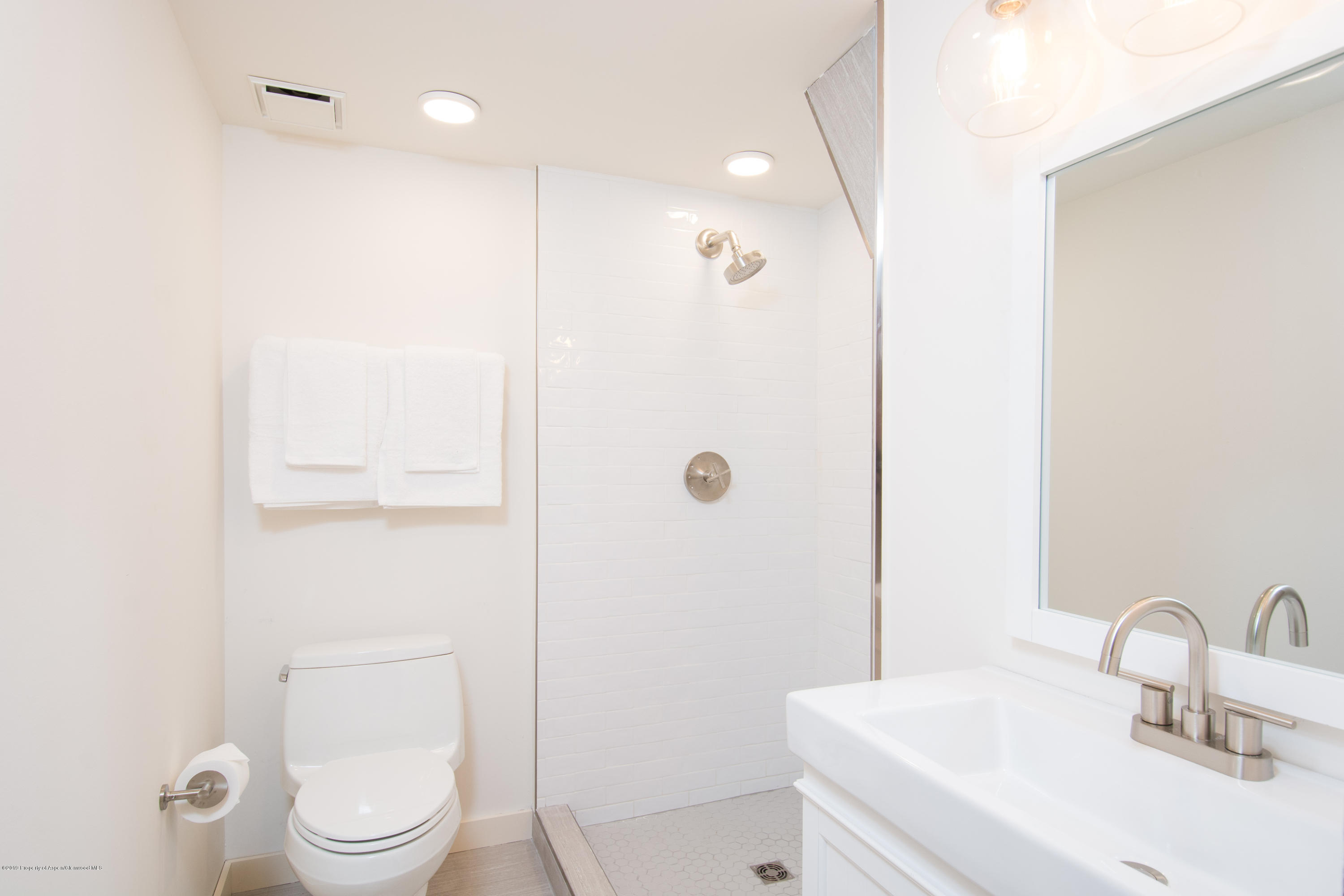 623 Faraway Road Snowmass Village, CO 81615 - Photo 15 of 30 a bathroom with a sink a toilet and shower