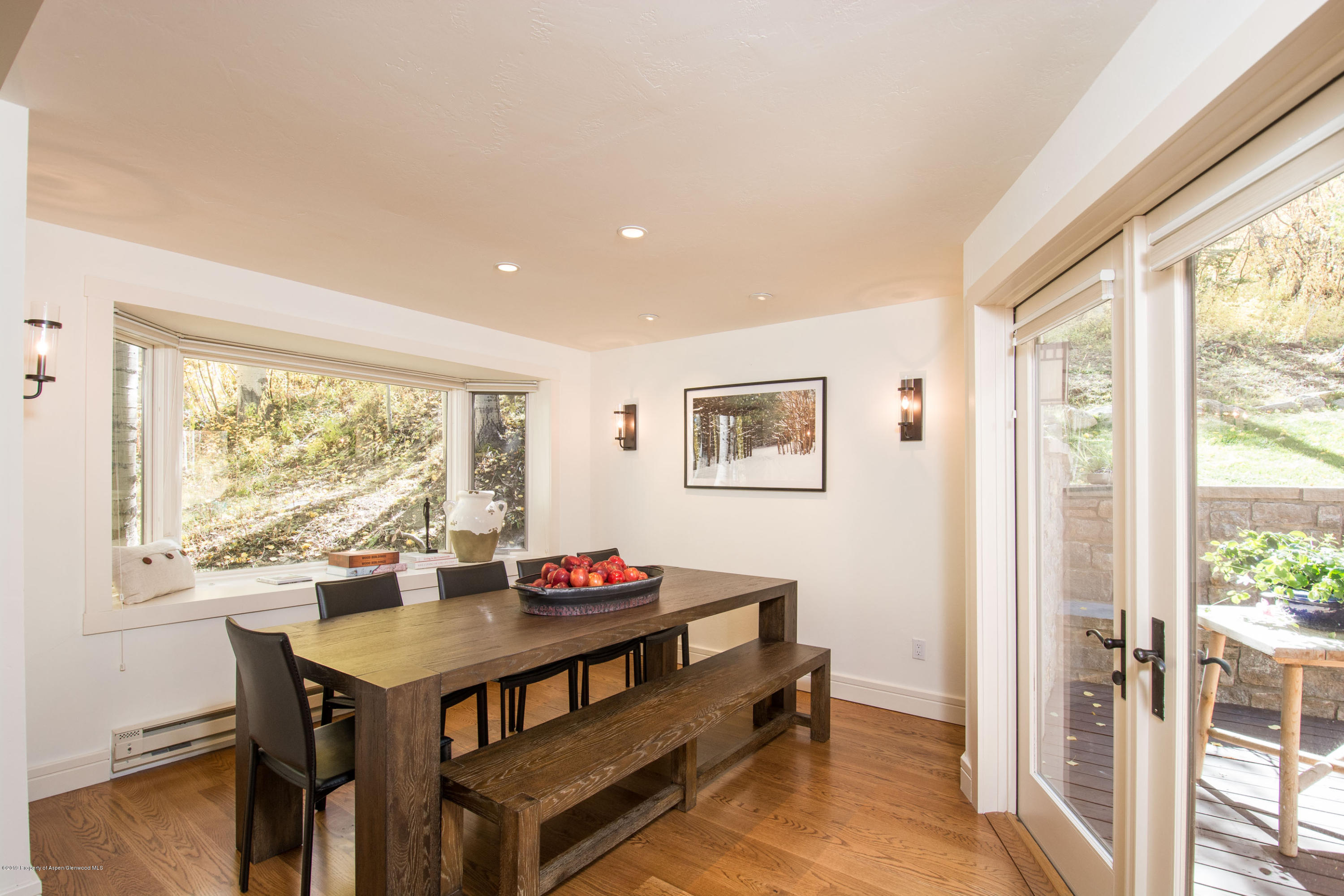 623 Faraway Road Snowmass Village, CO 81615 - Photo 5 of 30 a view of a dining room with furniture window and outside view