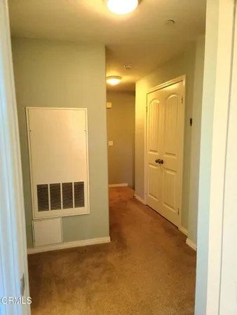 a bathroom with a tub and shower