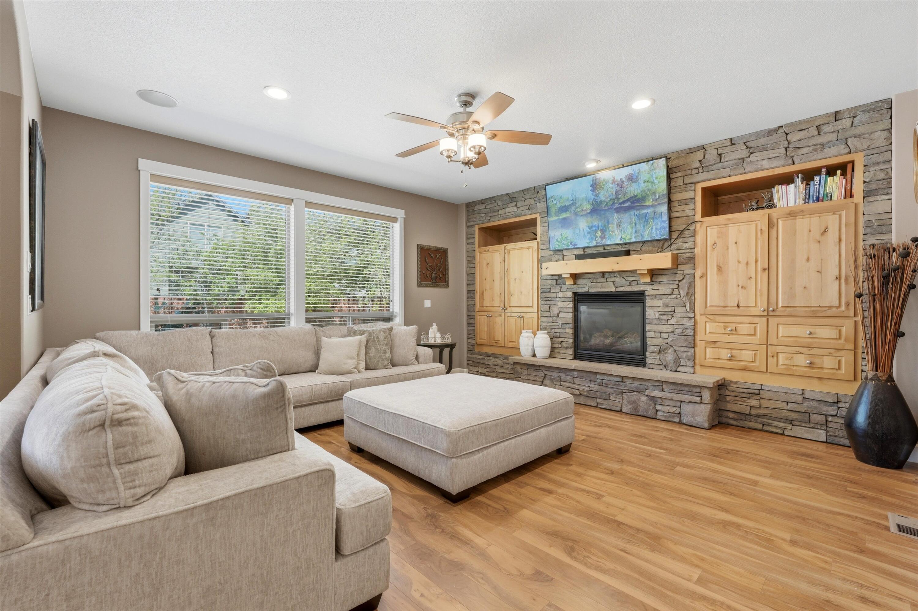 61235 Splendor Lane Bend, OR 97702 - Photo 30 of 52 Cozy and welcoming living room with built in storage and fireplace