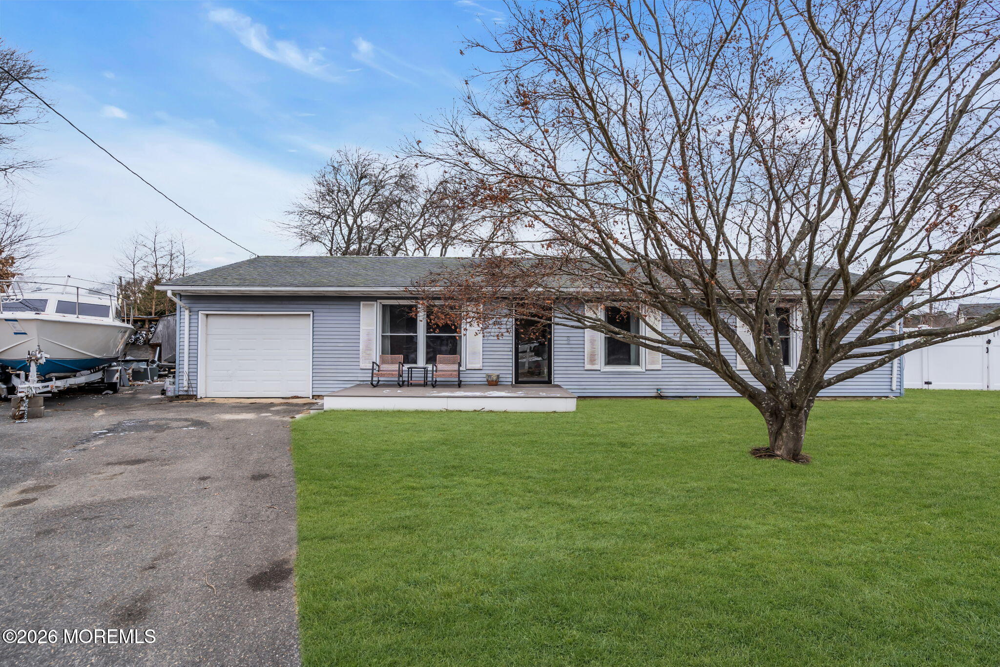 405 Decker Court Lanoka Harbor, NJ 08734 - Photo 3 of 21 a front view of a house with a garden