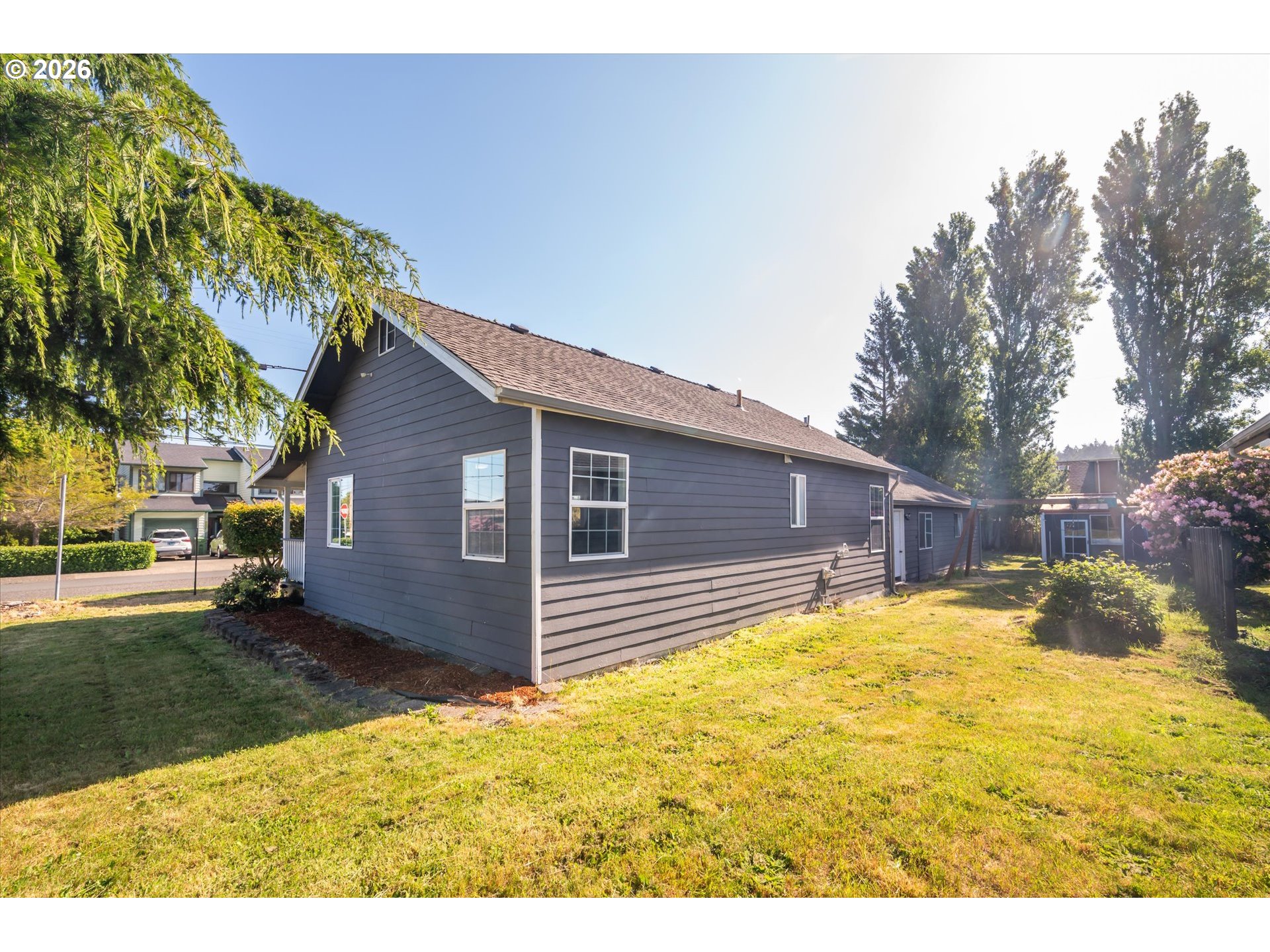 1789 14th Street North Bend, OR 97459 - Photo 41 of 43 a bathroom with a sink and yard