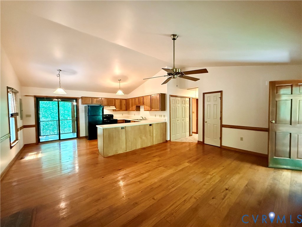 2590 Davis Mill Road Goochland, VA 23063 - Photo 13 of 33 a view of large kitchen with a sink and a stove top oven
