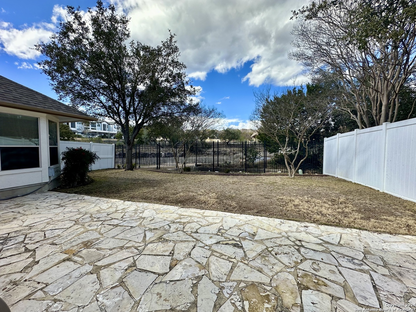23107 Osprey Ridge San Antonio, TX 78258 - Photo 27 of 28 a view of road with trees