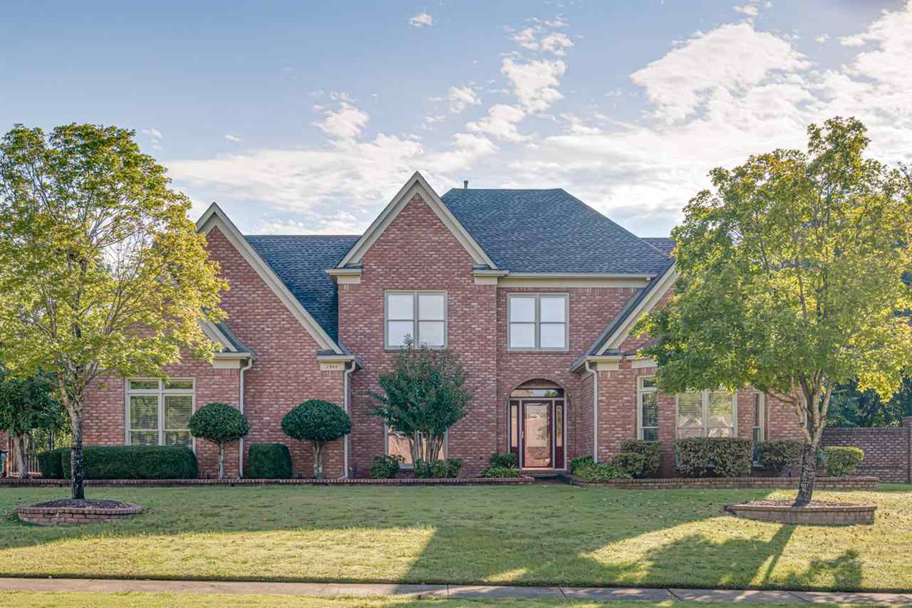 1344 Wahkin Road Collierville, TN 38017 - Photo 1 of 25 a front view of a house with a yard