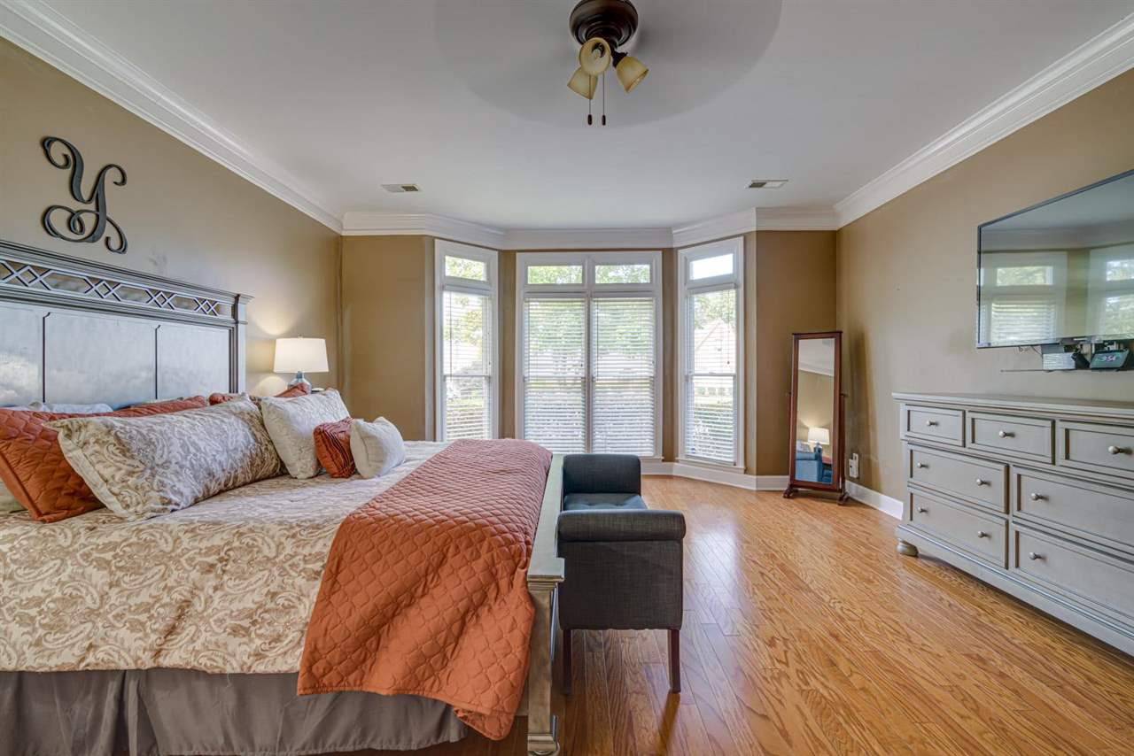 1344 Wahkin Road Collierville, TN 38017 - Photo 13 of 25 a bedroom with a bed and a dresser