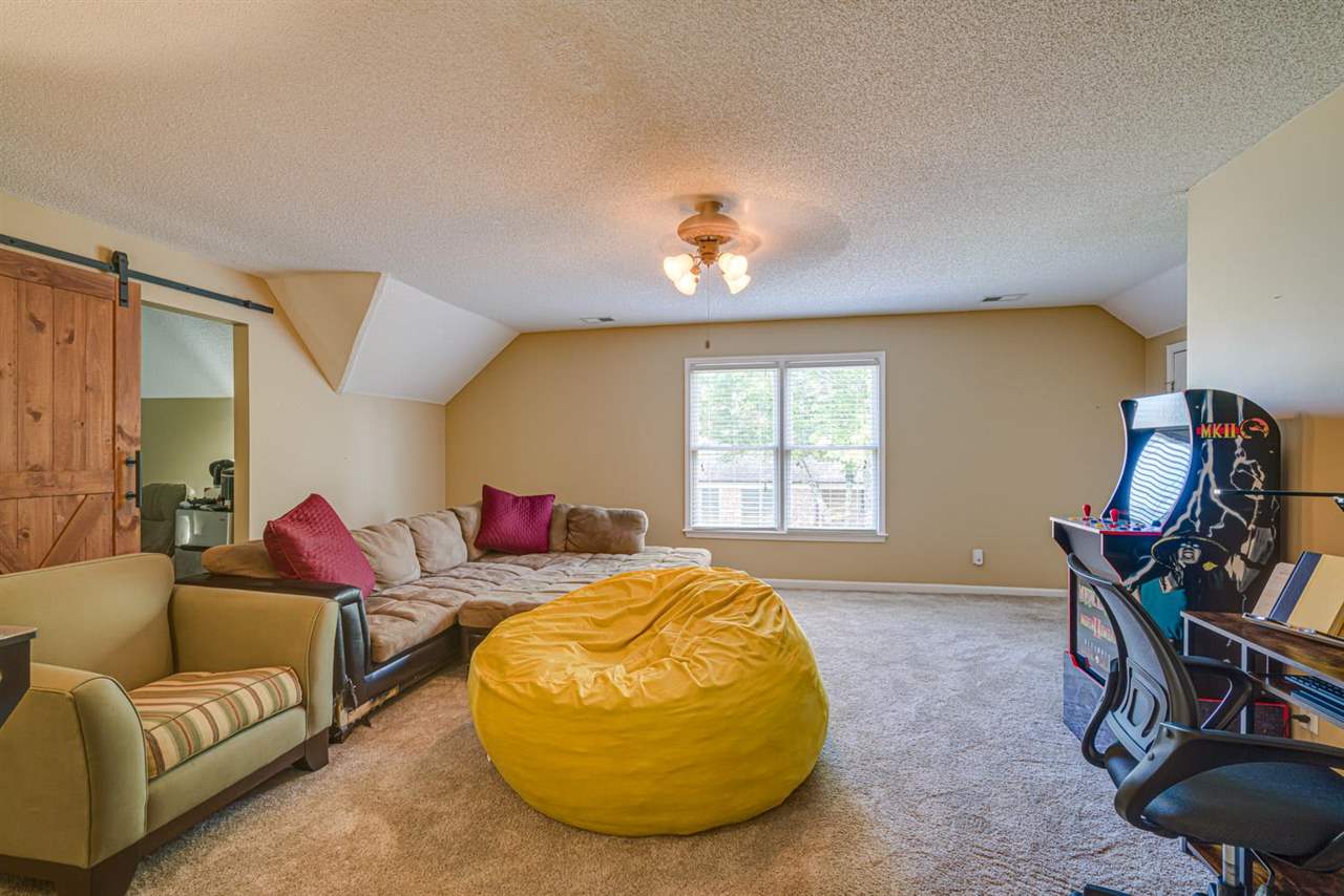 1344 Wahkin Road Collierville, TN 38017 - Photo 19 of 25 a living room with furniture and a window