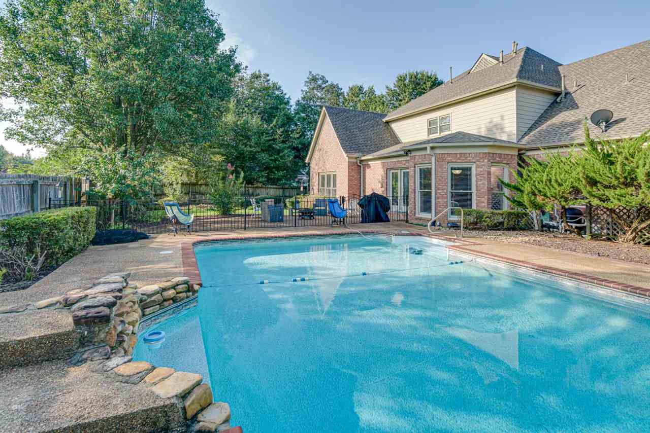 1344 Wahkin Road Collierville, TN 38017 - Photo 23 of 25 a backyard of a house with yard and outdoor seating