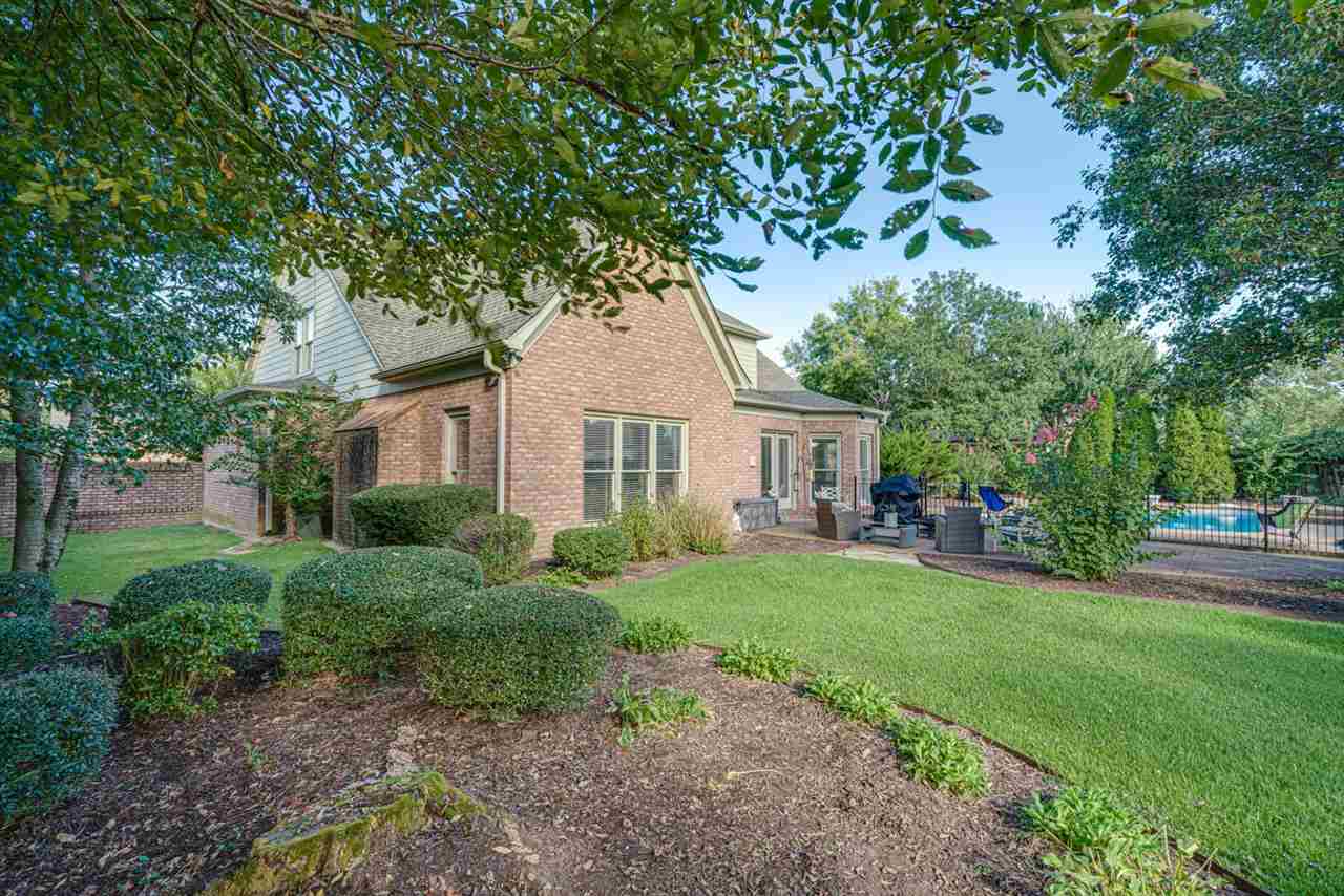 1344 Wahkin Road Collierville, TN 38017 - Photo 25 of 25 a front view of a house with a garden