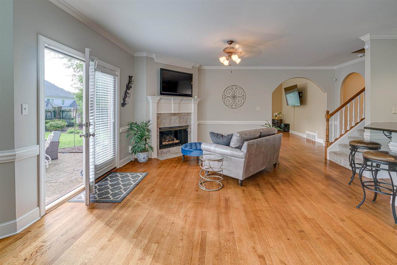 1344 Wahkin Road Collierville, TN 38017 - Photo 6 of 25 a living room with furniture and a fireplace