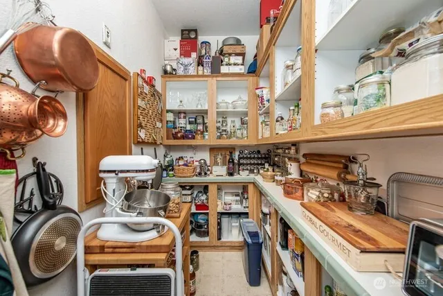 a utility room with sink dryer and washer