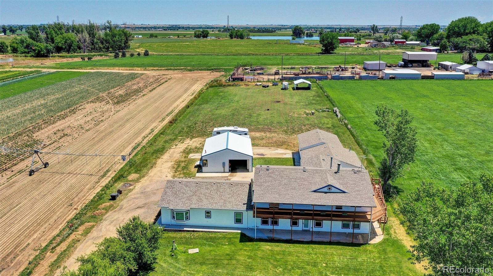 an aerial view of a house with a garden