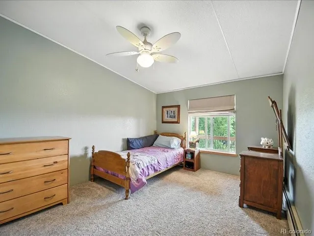 a bathroom with a sink a mirror and a bath tub