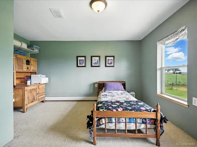 a view of a garage with storage