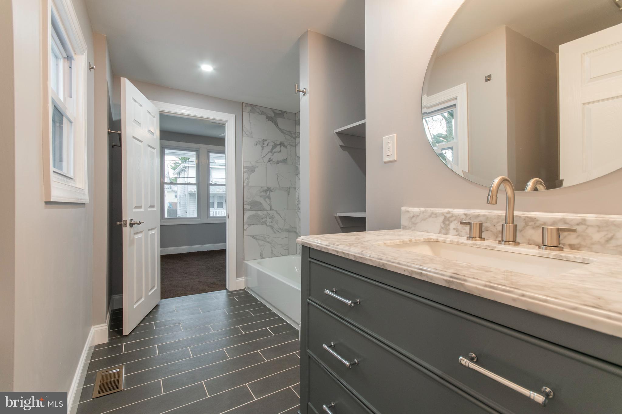 25 West Roland Road Brookhaven, PA 19015 - Photo 15 of 22 First Floor Full Bathroom