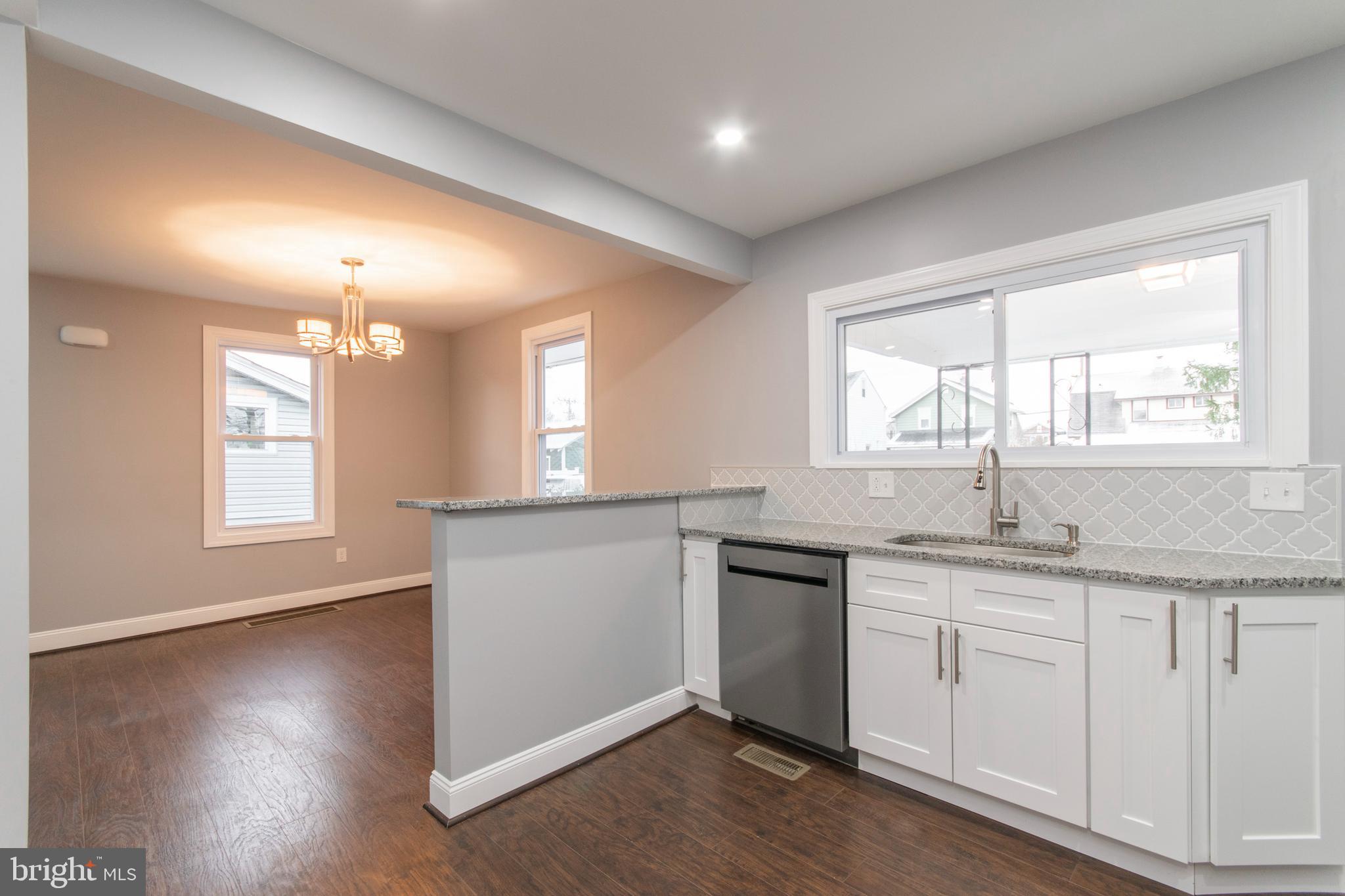 25 West Roland Road Brookhaven, PA 19015 - Photo 9 of 22 Kitchen into Dining Room