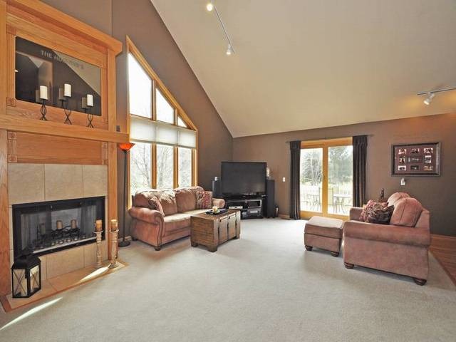1603 Beech Street Spring Grove, IL 60081 - Photo 2 of 24 a living room with furniture window and a fireplace