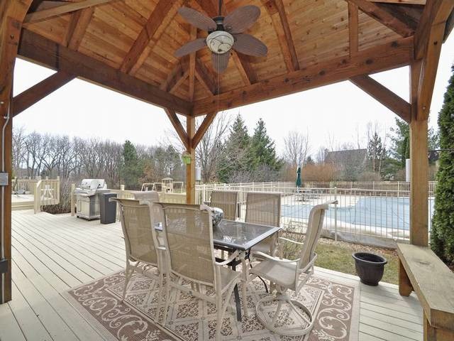 1603 Beech Street Spring Grove, IL 60081 - Photo 22 of 24 a view of a chairs and table in the patio