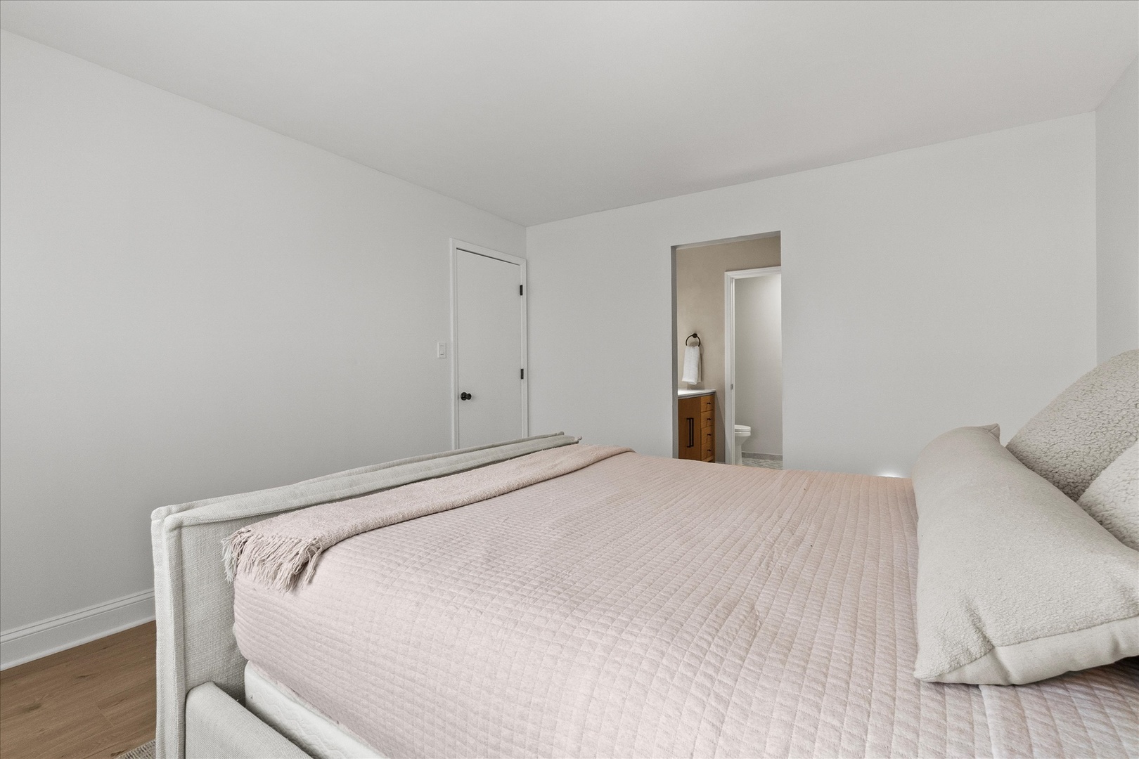 9051 South Roberts Road, Unit 310 Hickory Hills, IL 60457 - Photo 14 of 19 a bedroom with a bed and cabinets