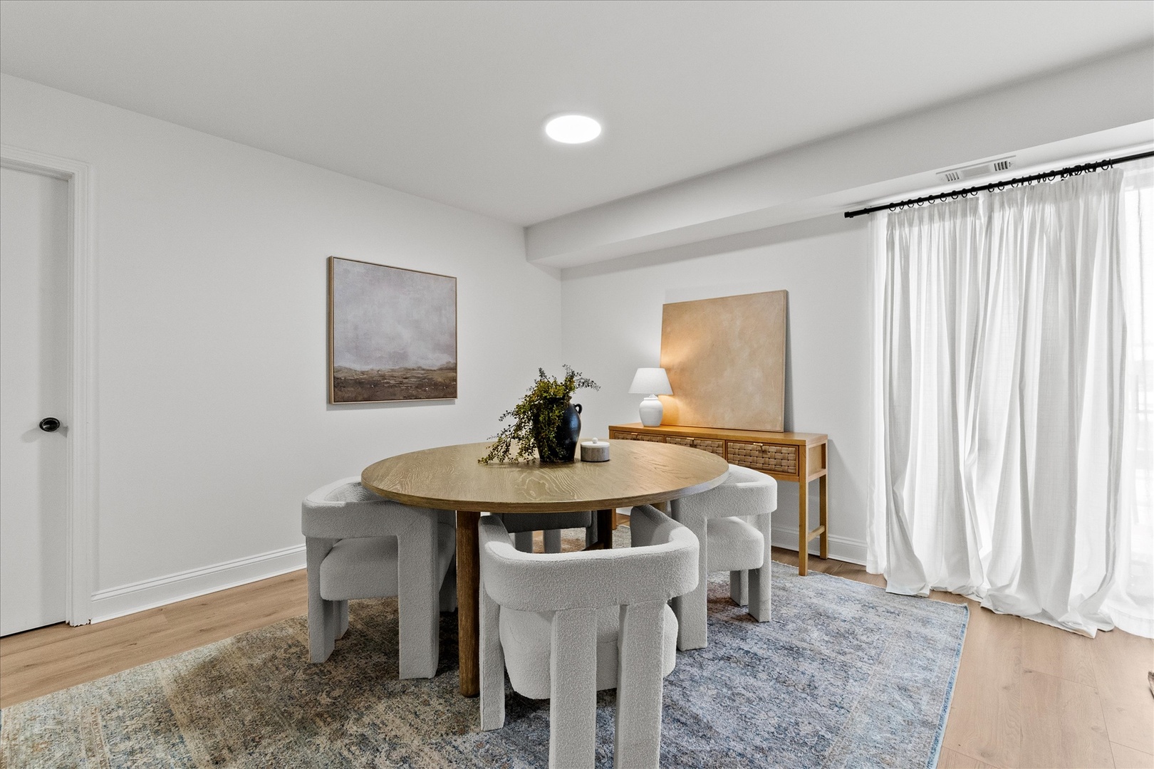 9051 South Roberts Road, Unit 310 Hickory Hills, IL 60457 - Photo 5 of 19 a dining room with furniture and window
