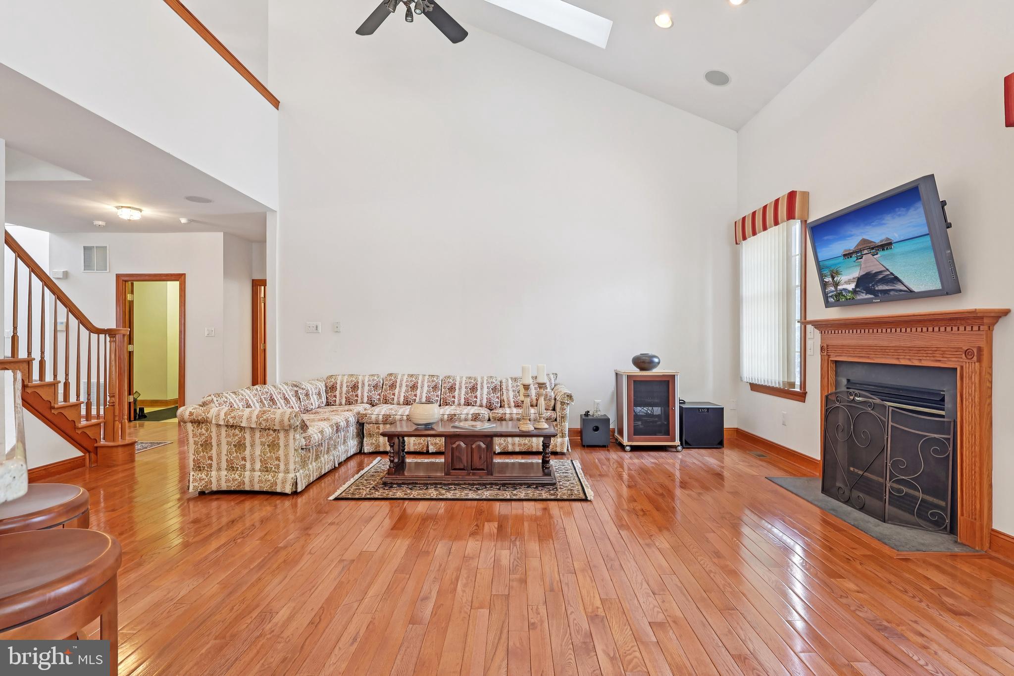 2 Kyle Court Mount Laurel, NJ 08054 - Photo 15 of 42 a living room with furniture wooden floor and a fireplace