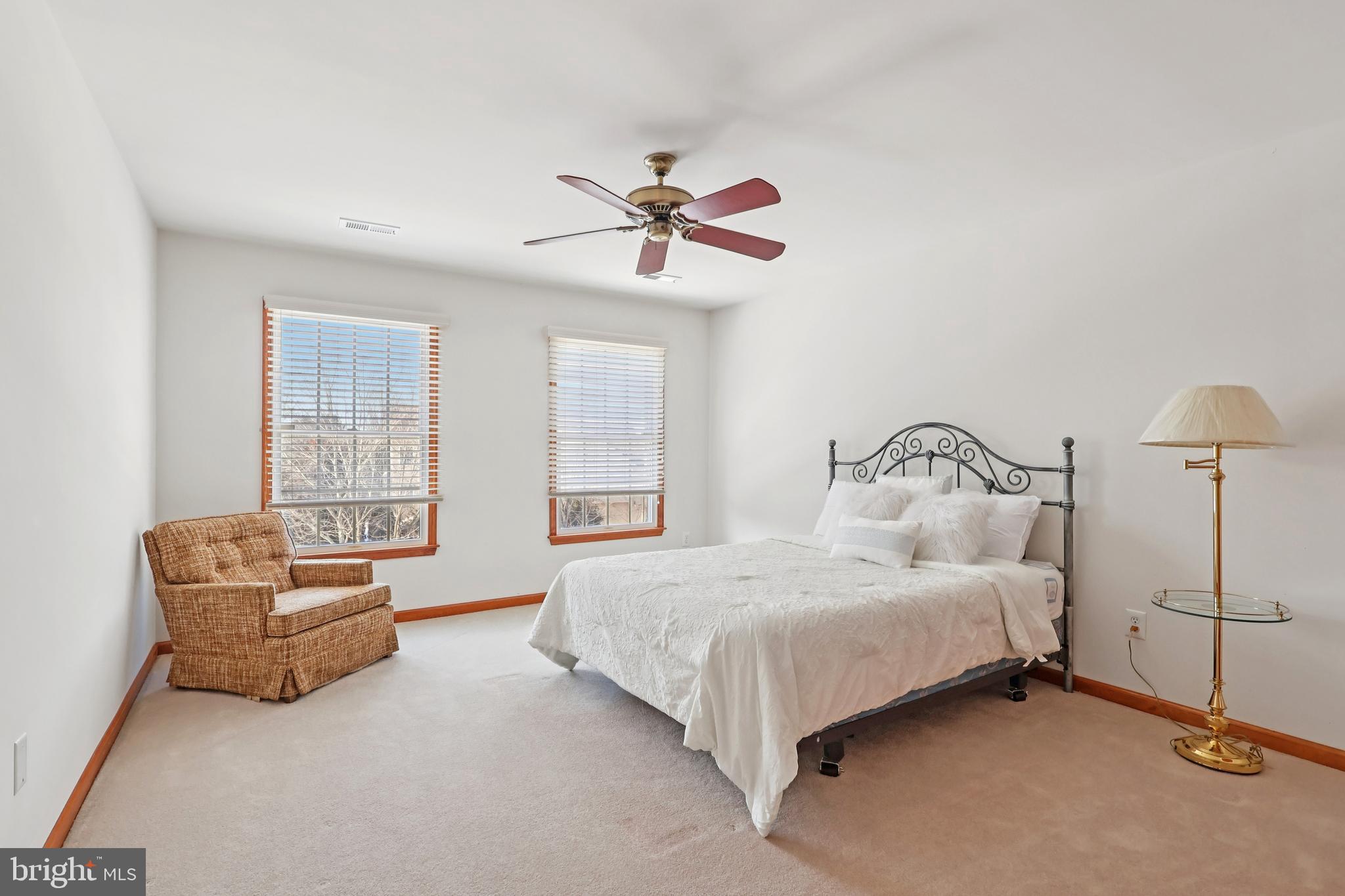 2 Kyle Court Mount Laurel, NJ 08054 - Photo 23 of 42 a bedroom with a bed couch and window