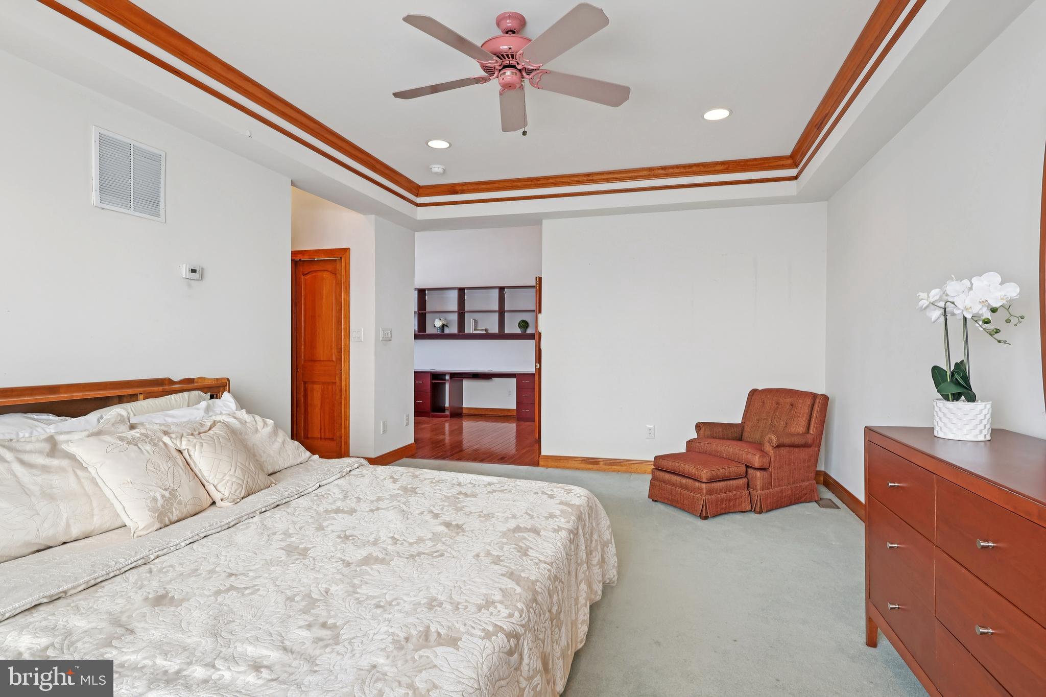 2 Kyle Court Mount Laurel, NJ 08054 - Photo 25 of 42 a bedroom with a bed and a chandelier