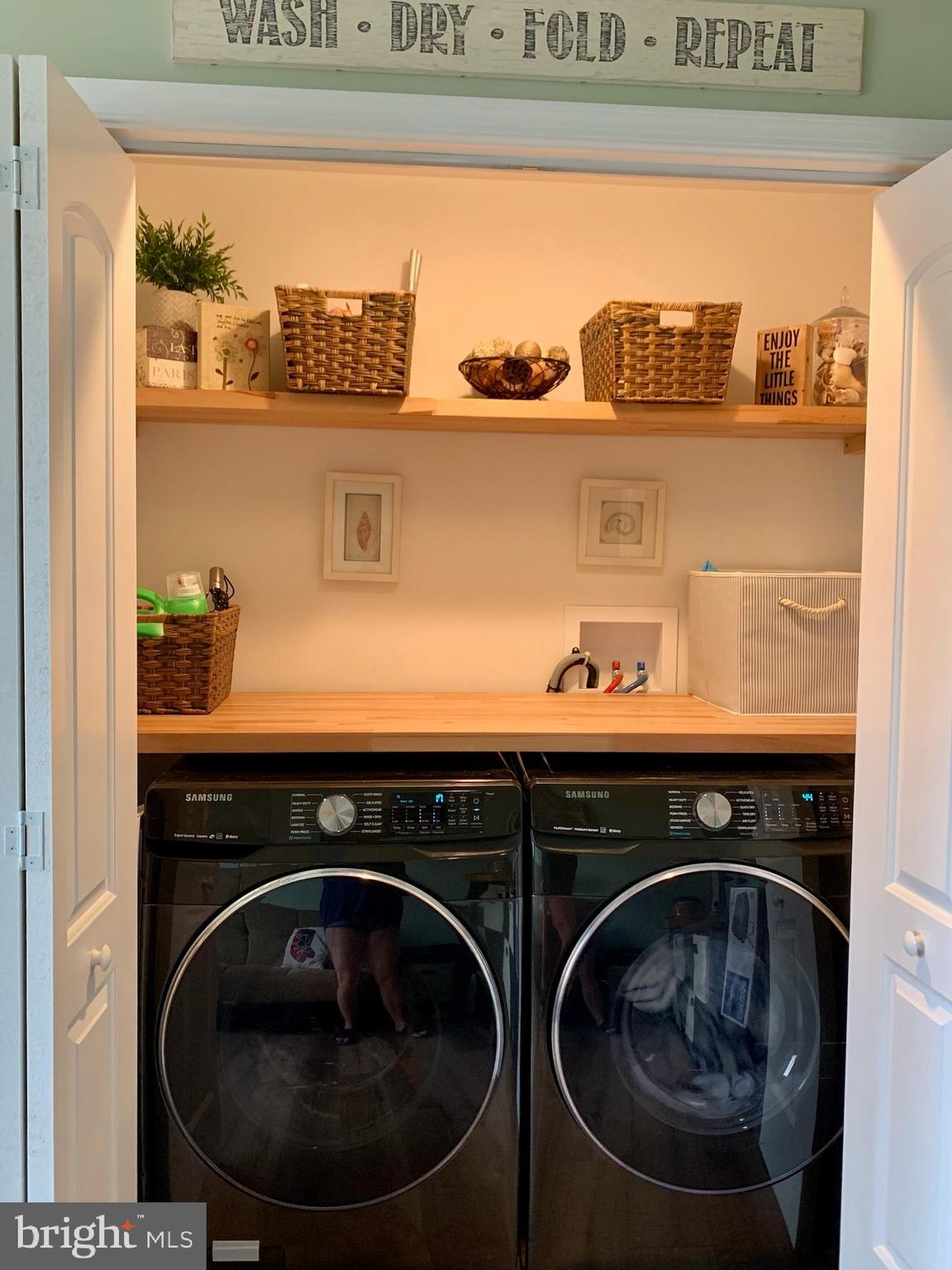 1890 Locust Road Pasadena, MD 21122 - Photo 19 of 53 a utility room with lots of washer and dryer