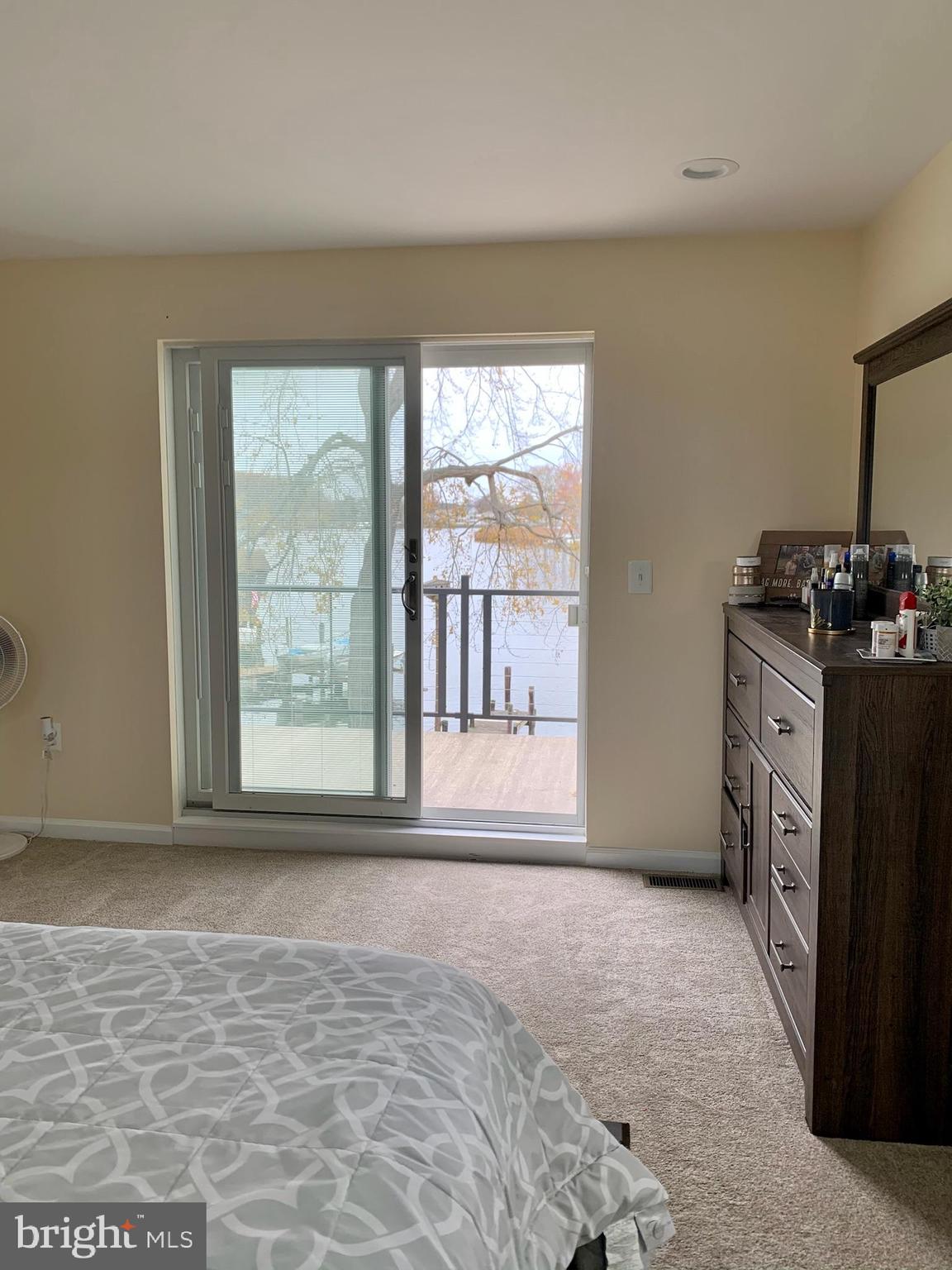 1890 Locust Road Pasadena, MD 21122 - Photo 22 of 53 a view of a room that has a bed and a window in it