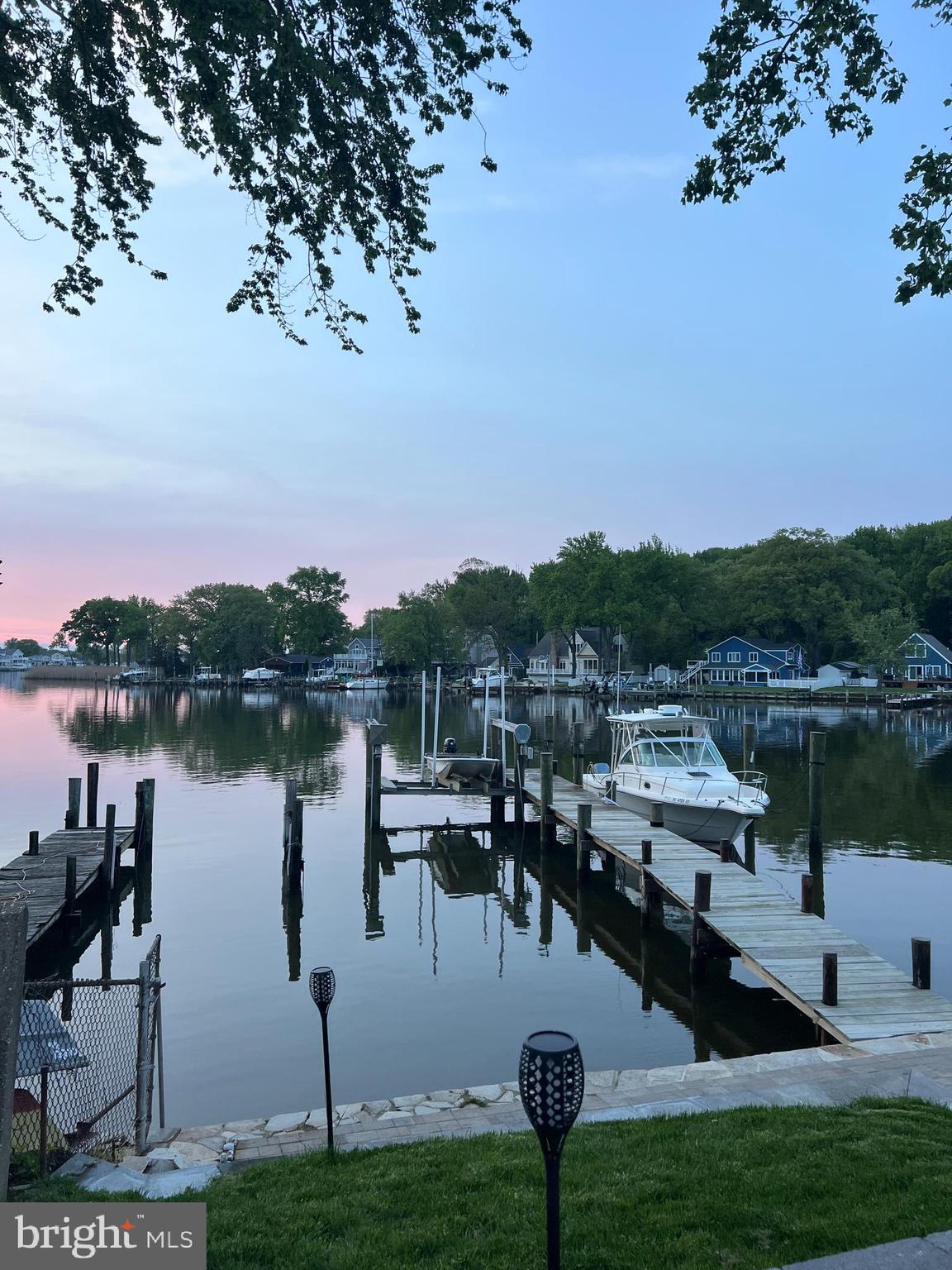 1890 Locust Road Pasadena, MD 21122 - Photo 29 of 53 a view of a lake with houses in the back