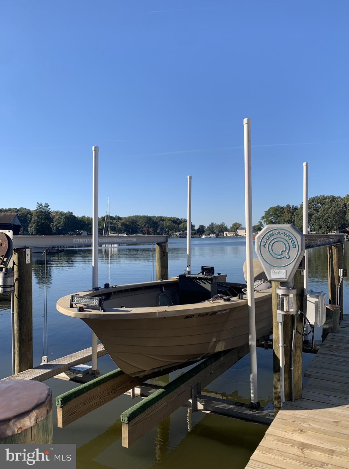 1890 Locust Road Pasadena, MD 21122 - Photo 31 of 53 a table and chairs sitting on a terrace