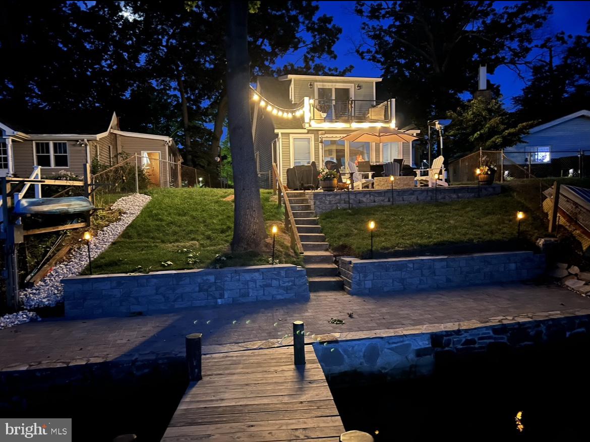 1890 Locust Road Pasadena, MD 21122 - Photo 33 of 53 a wooden bench sitting in front of building