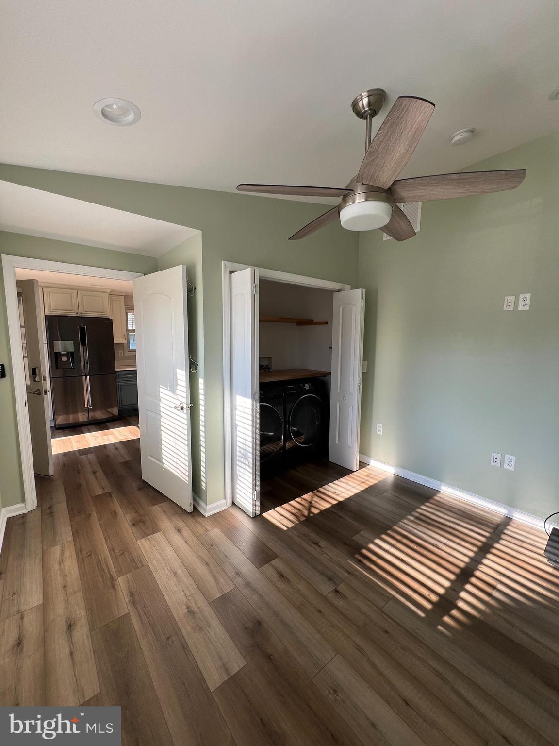 1890 Locust Road Pasadena, MD 21122 - Photo 37 of 53 a view of an empty room with wooden floor