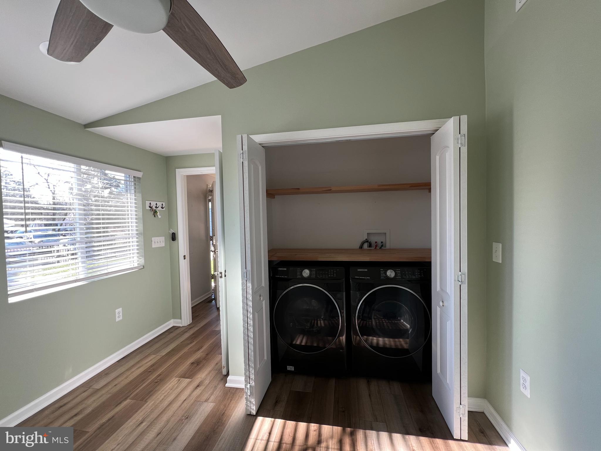 1890 Locust Road Pasadena, MD 21122 - Photo 39 of 53 a view of a hallway with a washer and dryer
