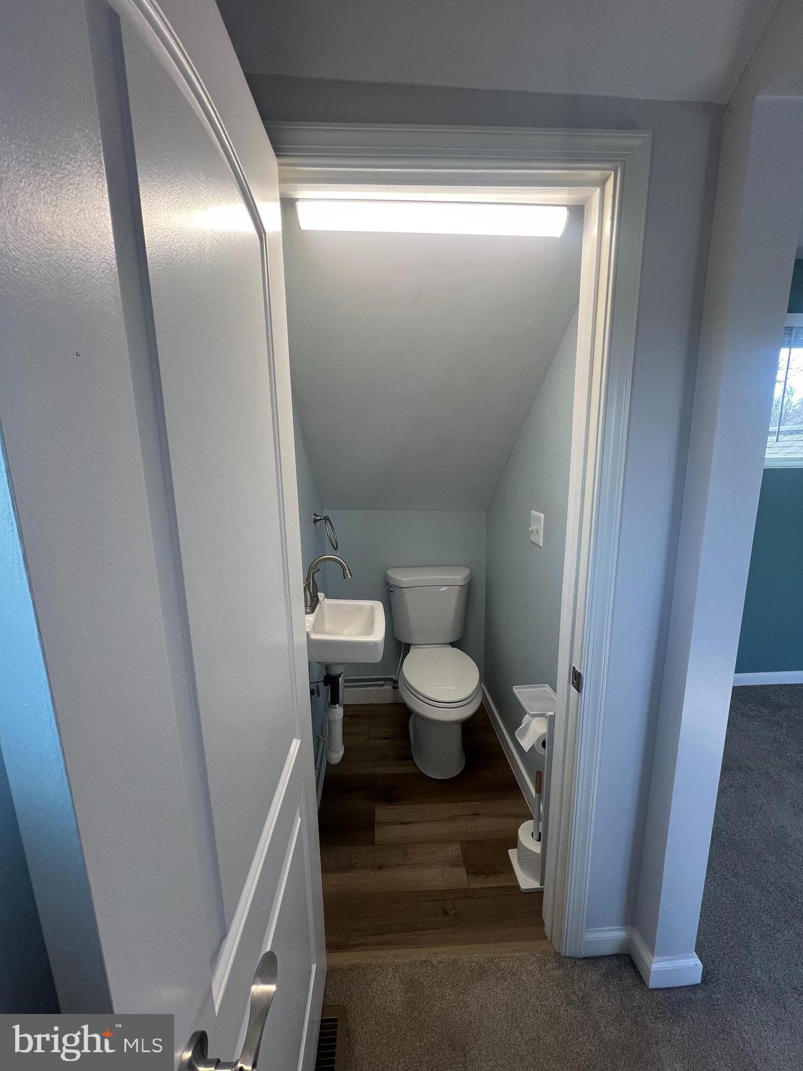 1890 Locust Road Pasadena, MD 21122 - Photo 40 of 53 a bathroom with a sink and a toilet