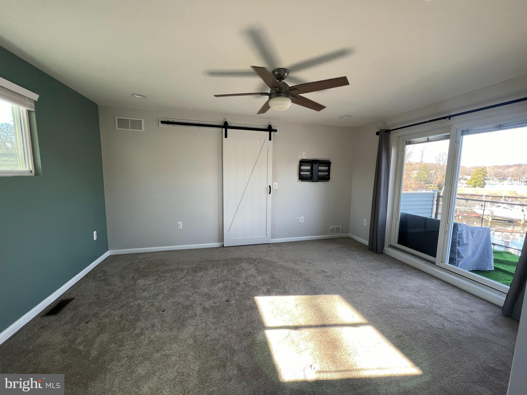1890 Locust Road Pasadena, MD 21122 - Photo 43 of 53 an empty room with windows