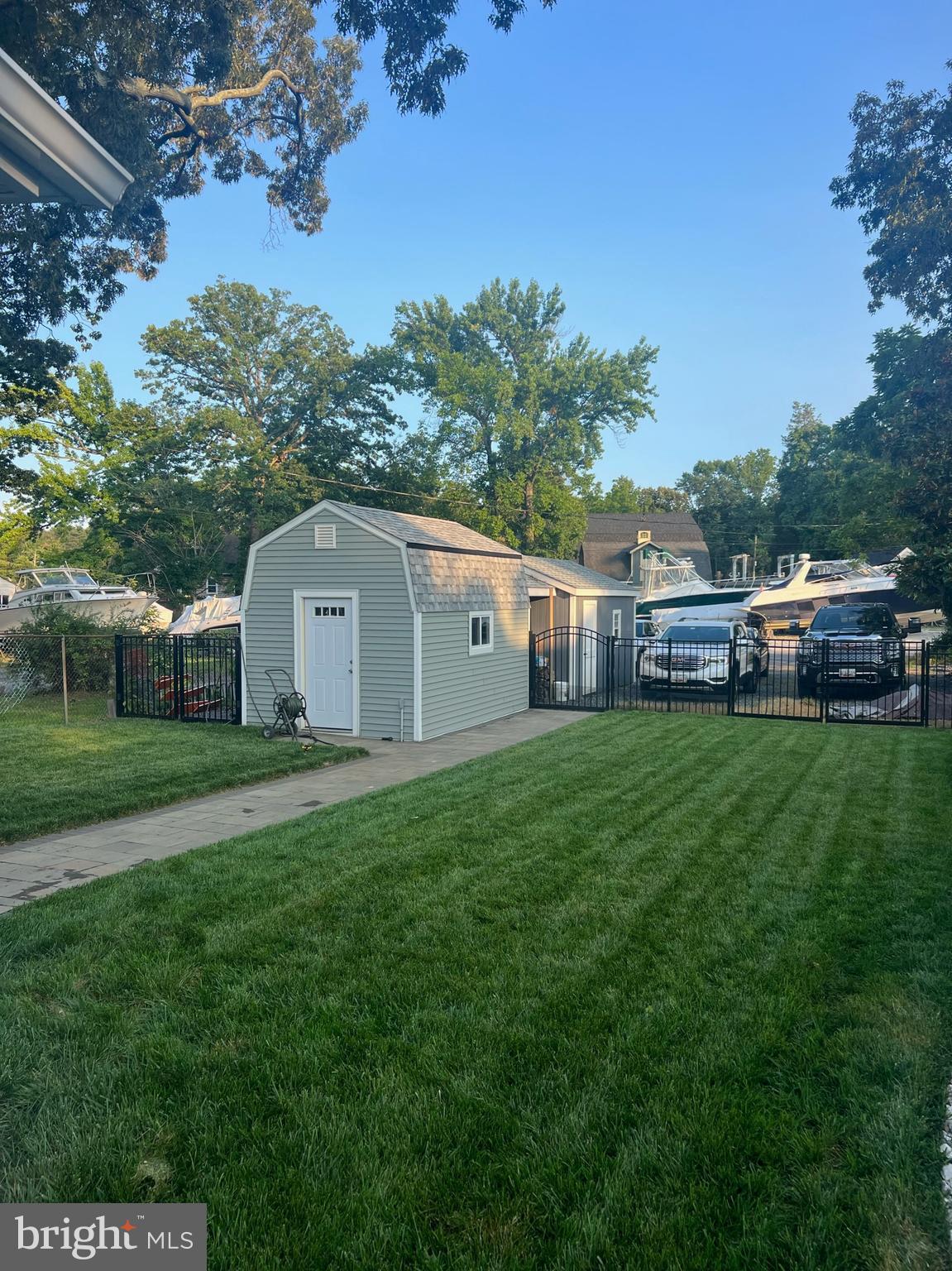 1890 Locust Road Pasadena, MD 21122 - Photo 5 of 53 a view of a house with backyard and sitting area