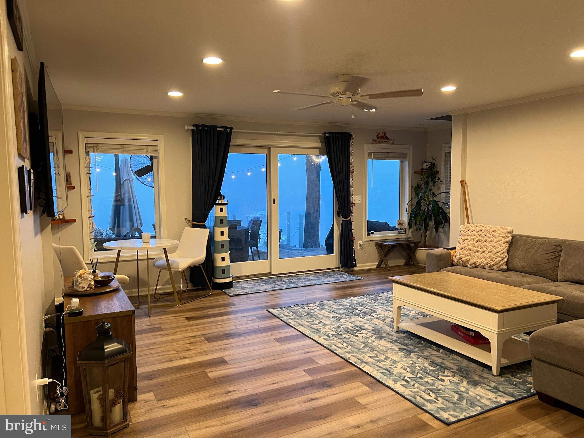 1890 Locust Road Pasadena, MD 21122 - Photo 6 of 53 a living room with furniture and a rug