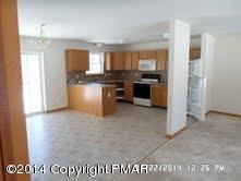 5 Pine Ridge Drive Bushkill, PA 18324 - Photo 4 of 12 KITCHEN AND DINING AREA