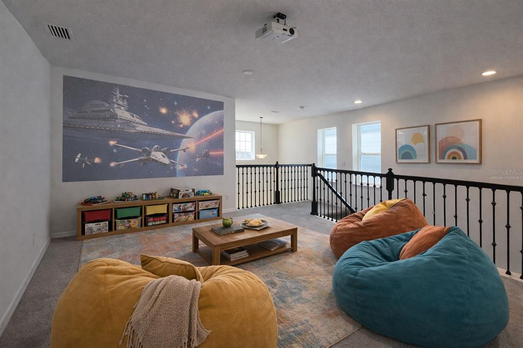 7036 Rolling Leaf Road Groveland, FL 34736 - Photo 7 of 18 a living room with furniture and a ceiling fan