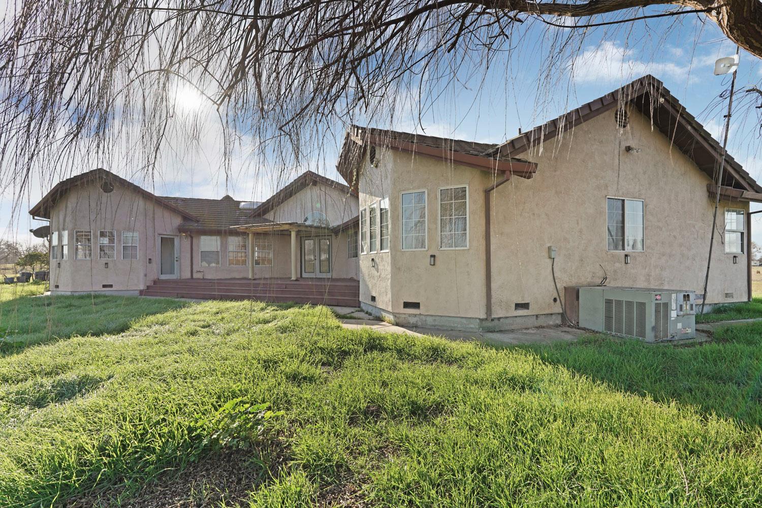 16321 South Wing Levee Road Stockton, CA 95206 - Photo 17 of 71 a front view of a house with garden