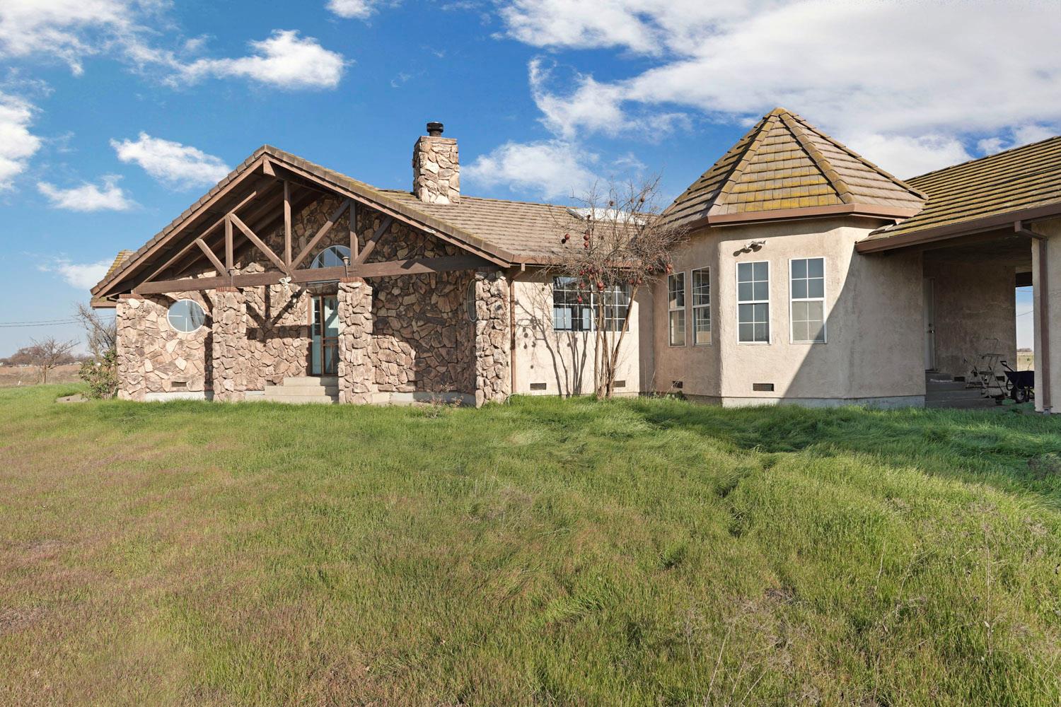 16321 South Wing Levee Road Stockton, CA 95206 - Photo 18 of 71 a front view of a house with garden