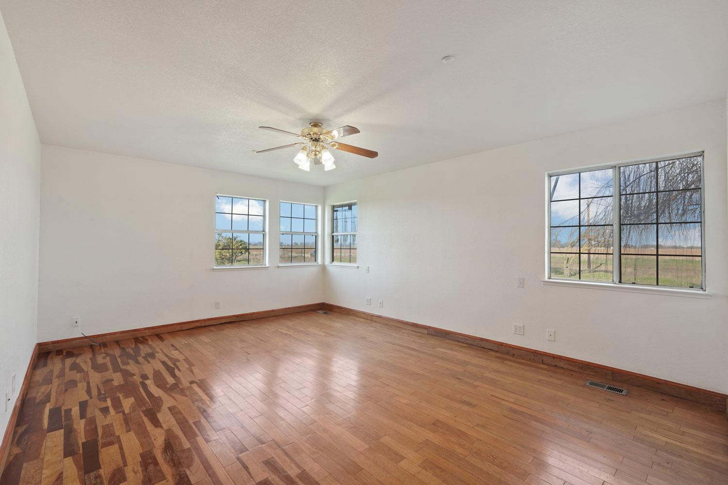 16321 South Wing Levee Road Stockton, CA 95206 - Photo 33 of 71 a view of an empty room with a window