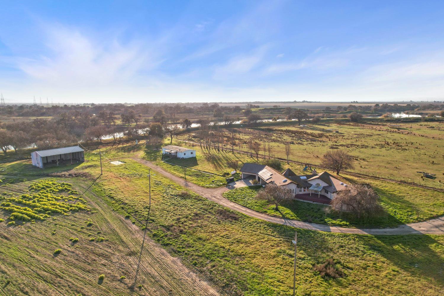 16321 South Wing Levee Road Stockton, CA 95206 - Photo 4 of 71 a view of a lake with a mountain view