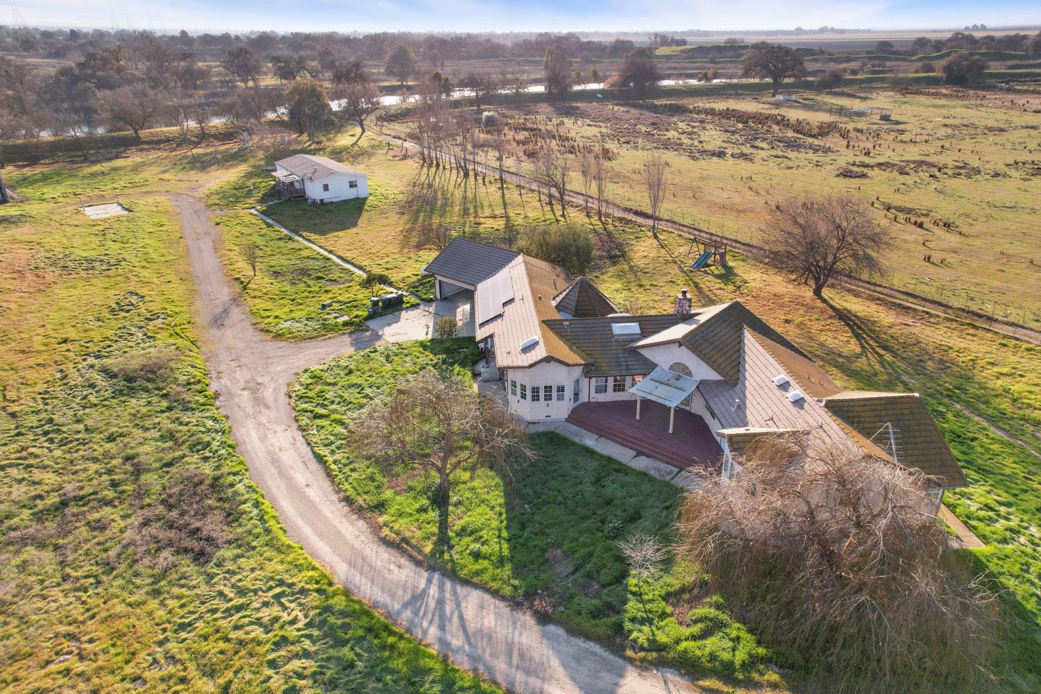 16321 South Wing Levee Road Stockton, CA 95206 - Photo 57 of 71 an aerial view of residential houses with outdoor space