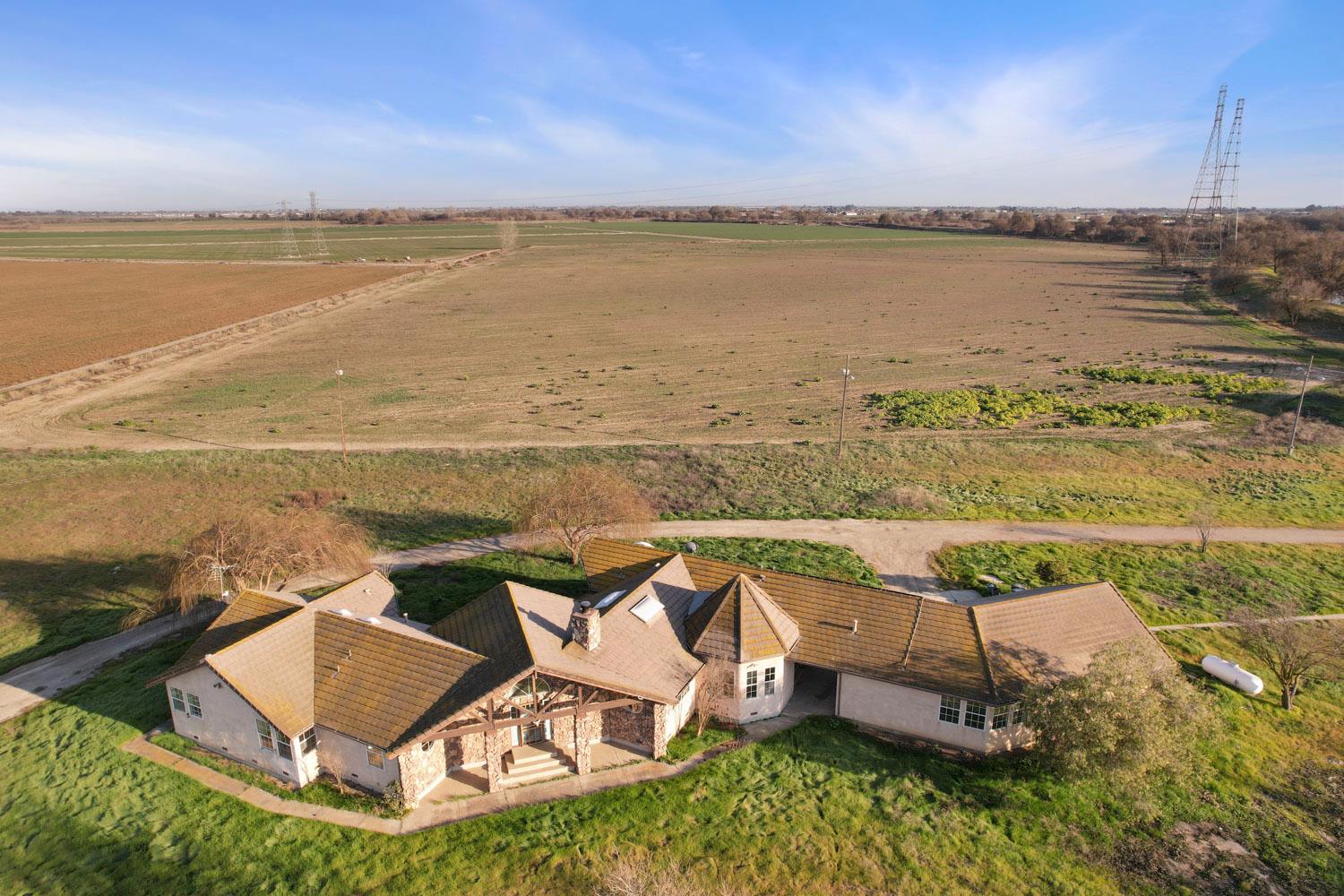 16321 South Wing Levee Road Stockton, CA 95206 - Photo 6 of 71 an aerial view of residential houses with outdoor space and ocean