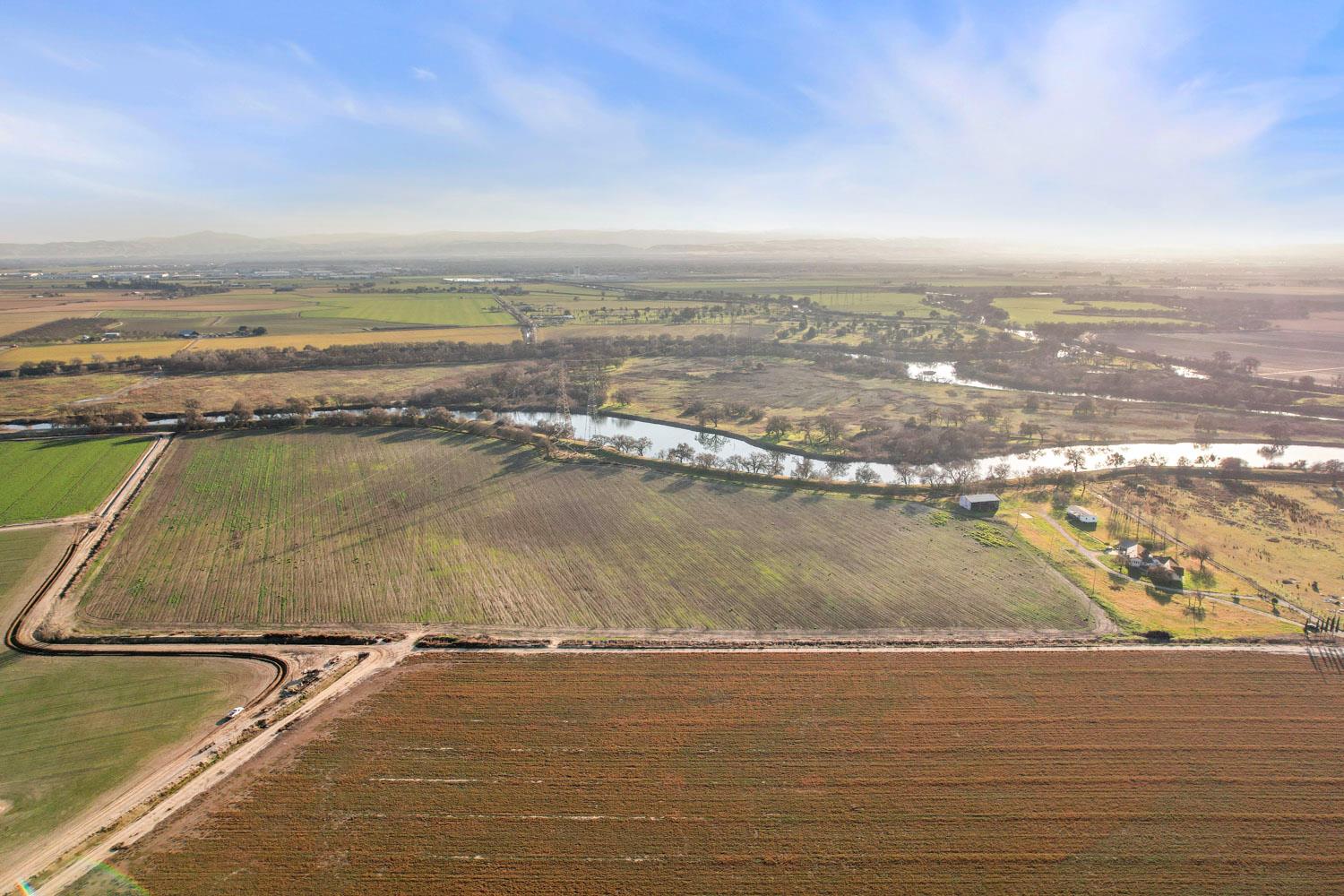 16321 South Wing Levee Road Stockton, CA 95206 - Photo 9 of 71 an aerial view of residential building with ocean view