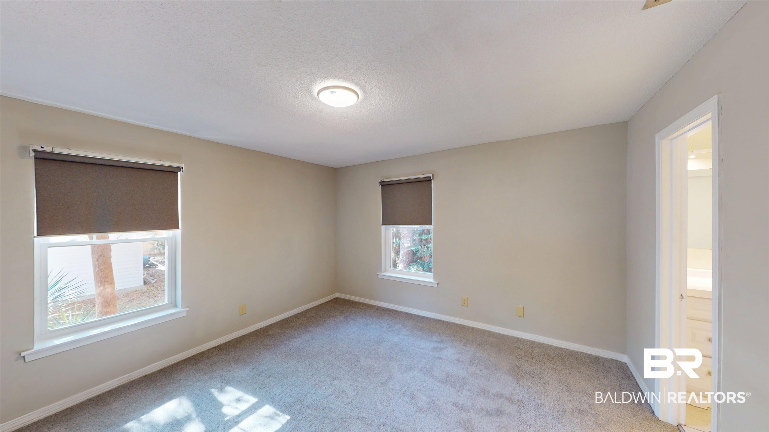 1471 Cedar Crescent Drive Mobile, AL 36605 - Photo 19 of 28 Unfurnished room with light colored carpet and a textured ceiling